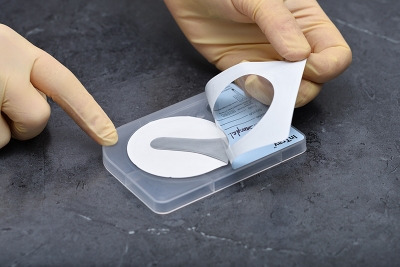 Peel back the outer label of InTray